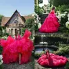 Doux 16 robes de Quinceanera 2019 robe de bal en tulle gonflé haut bas robe de soirée formelle avec des volants en cascade dos croisé