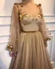 Robes de bal gothiques à manches longues en or 2019 col transparent fleurs en tulle à manches longues robes de soirée formelles robe de soirée brillante Robe De Mar7070423