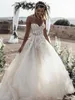 Ny Boho Beach Sexig En Linje Bröllopsklänningar Sweetheart Appliques Lace Tulle Ärmlös Tulle Sweep Train Arabiska Bröllop Formella Bröllopklänningar