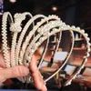 Nieuwe luxe grote parelhoofdband vrouwen boog zonnebloem hoepels meisjes haaraccessoires mode sieraden accesorios para el cabello mujer