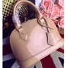 Designer ALMA BB shell bag women patent leather flower Embossed shoulder bags with lock crossbody bag handbags.