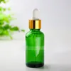 Vente chaude 440pcs 30ml bouteilles en verre vert avec bouchon à l'épreuve des enfants bouchons à vis huile essentielle cosmétique vide flacons compte-gouttes en verre 30ml en stock