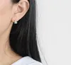 Belles femmes Badminton boucles d'oreilles alliage couleur argent tempérament personnalité créative goujons boucle d'oreille oreille bijoux de mode