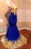 2019 Pasy spaghetti Satin Mermaid Long Prom Dresses Royal Blue Lace Aplikacja Backless Sweep Pociąg Formalny Party Nosić suknie wieczorowe