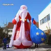 Decorazioni natalizie all'aperto Gigante Giant Babbo Natale Babbo Natale 3m / 6m Altezza Carattere di Natale Salta St Nicholas con un sacchetto regalo per il parco