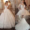 Splendidi abiti da sposa con maniche lunghe da ballo 2020 Arabo trasparente con scollo gioiello Illusion con bottoni sul retro Abiti da sposa in pizzo ricamato AL4171