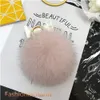 10 cm Mignon Doux Réel Boule De Fourrure De Renard Pompon Charme Porte-clés Téléphone Pendentif Porte-clés Cadeau Glands