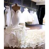 2024 Sexy Luxurious Mermaid Wedding Dresses Sweetheart Sleeveless Backless Satin Tiered Ruffle Cathedral Train Formal Bridal Gowns 403