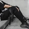 2019 Новые хип-хоп бегуны Мужские черные шаровары-карго с несколькими карманами и лентами Мужские спортивные штаны Уличная одежда Повседневные мужские брюки 3XL V191108