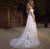 Vintage Country Style A-Line Bröllopsklänningar Sweetheart Sheer Straps Lace Appliques Tulle Boho Bohemian Beach Bridal Gowns Sweep Train