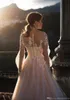 Champagne Lace Bohemian A Line Abiti da sposa Sheer Maniche lunghe Tulle Lace Applique Sweep Train Abito da sposa Abiti da sposa robes de mariée