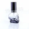 caliente colorido portátil 8ML mini botella de vidrio Cráneo botella de perfume botella de spray grueso coche hogar decoración moderna HomewareT2I5637