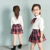 Retail Kids Designer Tracksuits Girls Curve Camisa + xadrez Saias 2 peças Outfits Moda coreana de manga longa Suits Set Crianças Conjuntos de roupas