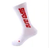 Letter fluorescent left and right foot towel bottom fission trend sports socks non-slip tide socks