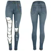 Mode gedurfde ontwerp vrouwen slanke denim jeans gescheurde ketting grote gat broek potlood broek tonen lange slanke benen mager