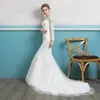 Vestidos de novia de sirena de tul de manga larga Tren de barrido 2019 Apliques de encaje con cuello joya Vestidos de novia delgados