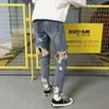 Vår Höst Ny Vintage Ripped Jeans för Mens Mode Casual Knee Längd Byxor Män Kläder Byxor Denim Hole Bottom DS50763