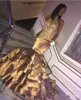 Nowa Gold Mermaid Prom Dresses Halter Keyhole Satin Crystal Frezowanie Wielopięciowe Ruffles Sweep Pociąg Specjalne okazje Formalne wieczorowe suknie wieczorowe