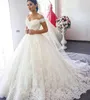 Spetsar utanför axeln bröllopsklänningar arabiska 2020 Sheer Back Princess Illusion Applique Bridal Gowns Robe de Mariage 33 0509 0510