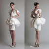 2020 Weiße Etui-Brautkleider mit Überrock, transparenter Ausschnitt, Applikationen, knielang, kurze Brautkleider nach Maß