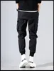 Męskie kieszenie boczne Cargo Harem Spodnie 2019 Hip Hop Casual Męskie Tatical Joggers Spodnie Moda Casual Streetwear Spodnie Y19073001