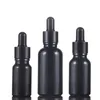 Hurtownia popularna 10 ml 15 ml 20 ml 30 ml 50 ml 100 ml czarnego szklanego olejku eterycznego butelki kosmetyczne z pipetą dla esencji olej brody