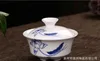 中国の伝統的な茶セットギフトボックスティーセットセラミックカンフーティーセット6カップ1ポットロータス唐詩プラム