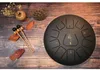 12 tum 11 anteckningar Percussion Drums Steel Tongue Drum Hand Pan Drum med trumman