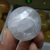 Кальцит 50mm ясный оптически с шариком сферы шпата Исландии радуг сладостным кристаллическим