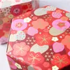 Sześciokąt Plum Blossom Cherry Flower Wzór Papier Cukierki Box Wedding Favor and Gift Party Decoration Konfigurowalny wzór 7.5x7.5x5.5cm