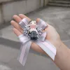 Highend Wedding Wrist Flower Man och Bridesmaid Cartoon Creative Wrist Flowers Konstgjorda Blommor För Corsage Bröllopsdekorationer