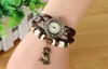 Dameshorloge Meisje Retro Lederen Winding Armband Owl Hanger Touw Weave Animal Tag Dameslegering Polshorloge