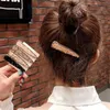 Forcine laterali di design di lusso barocco, tutte abbinate a semplici fermagli per capelli in cristallo, compongono fermagli per capelli a forma di anatra per ragazze