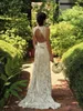 2022 Guaina in pizzo con scollo a V Abiti da sposa Sweep Train con Bowknot Backless Abito da sposa sexy nudo e avorio Plus Size Custom Made