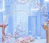 DIYの結婚式の装飾錬鉄製のリングアーチの背景単眼アーチのドア屋外の芝生の絹の花のドア棚スタンド