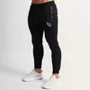 Nya män joggar casual fiess sportkläder bottnar mager sweatpants byxor manliga gym