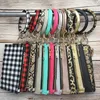 Runda PU Läder Bangle Hang Change Purse Telefonväska Koppling Wristlet Keychain Armband för Kvinnor Flickor Julsmycken Gåvor