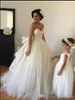 Latest Lace Ball Gown Wedding Dresses Sweetheart Neck Beaded Lace Fluffy Tulle Custom Made Princess Wedding Gowns