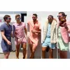 Sommar Fashion Short Sleeve Mens Rompers Male Single Breasted Jumpsuit Cargo Kort Byxor Pojkvän Zip Byxor Party Overaller