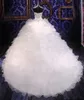 2023 Lyxiga balklänningar med pärlor Bröllopsklänningar Brudklänningar Prinsessan Sweetheart Korsett Organza Volanger Katedraltåg Vestido De Novia