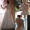 2020 Modest Keyhole High Neck Kortärmad En Linje Evening Klänningar Lace Applique Beaded Crystal Ruffles Formella Klänningar Sweep Train Party Gown