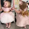 Mooie roze korte bloem meisjes kids pageant jurken formele gelegenheid lovertjes boog kant prom feest baby peuter kleine eerste communie