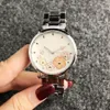 Moda M Diseño de flores Relojes de marca Mujer Chica Banda de acero de metal Reloj de pulsera de cuarzo M72