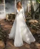 Fabuleux dentelle dos nu robes de mariée appliqué col en V profond manches longues robes de mariée une ligne balayage Train robe de mari￩e