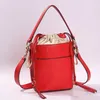 2022 Deporte al aire libre Vintage Cuero genuino Mujeres Bolsas de cubo Diseño simple Samll Bolso Cordón Tote Hombro Crossbody Drew C2282