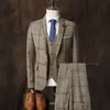 Trajes personalizados de otoño e invierno, trajes de hombre, versión coreana juvenil de tres piezas para bodas de hombres británicos ca