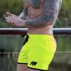 Shorts d'été chauds hommes mode haute qualité bas court mâle respirant couleurs unies Shorts de plage hommes court mâle