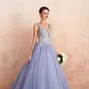 2019 New Sexy V-Neck Backless Crystal Purple Ball Gown Quinceanera Dresses Tulle Sweet 16 Dresses Debutante 15 Year Formal Party Dress BQ215