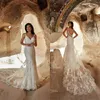 2020 Eddy K sjöjungfru Bröllopsklänningar Sexig Spaghetti Strap Ärmlös Appliqued Lace Bridal Gown Backless Tiered Tulle Boho Robes de Mariée