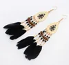 Bijoux populaires européens et américains femme rétro style national goutte d'eau gland plume boucles d'oreilles longues boucles d'oreilles WY482